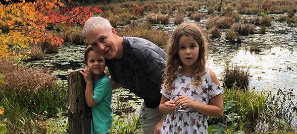 Tom Andrix with his grandson and granddaughter